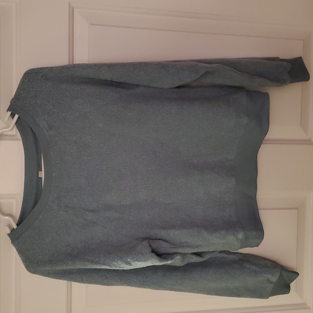 Light blue fuzzy crew neck sweatshirt